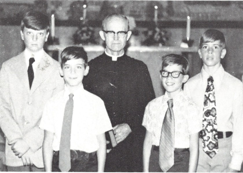 Father Joseph Korman and several Students